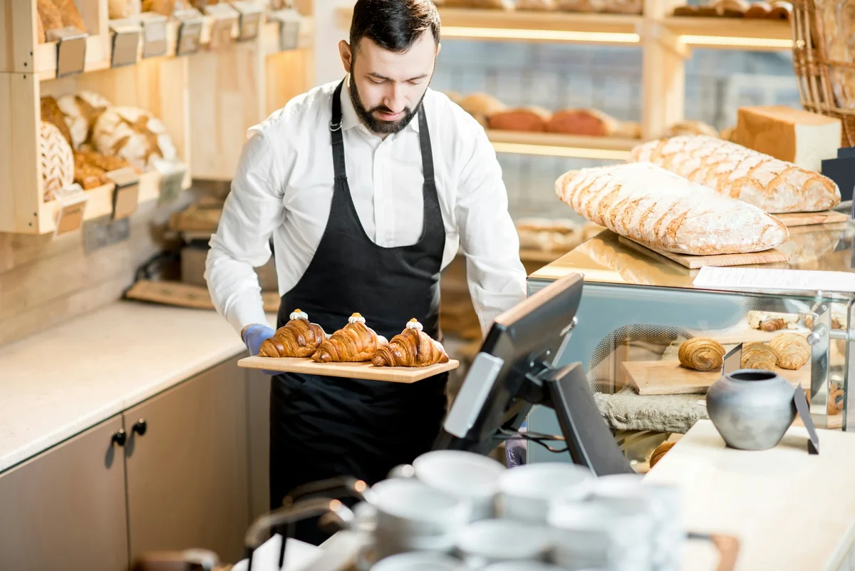 Art's Bakery and Cafe storefront in Duluth with display of fresh baked goods